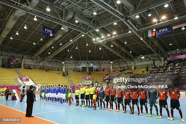 Teams line up for the national anthems during the FIFA Futsal World Cup, Round of 16 match between Italy and Egypt at Korat Chatchai Hall on November...