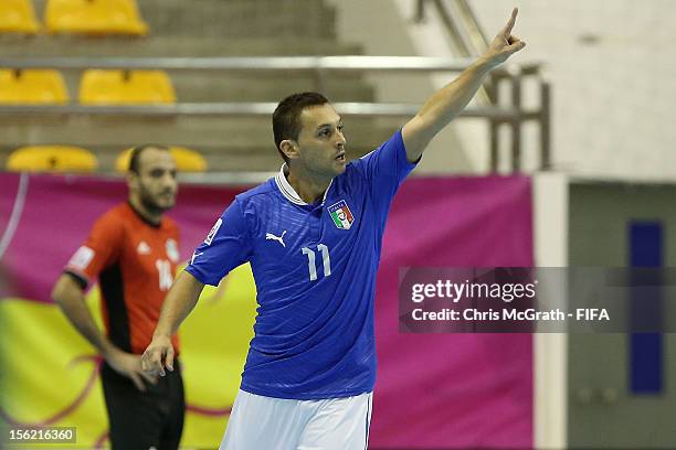 Saad Assis of Italy celebrates scoring a goal against Egypt during the FIFA Futsal World Cup, Round of 16 match between Italy and Egypt at Korat...