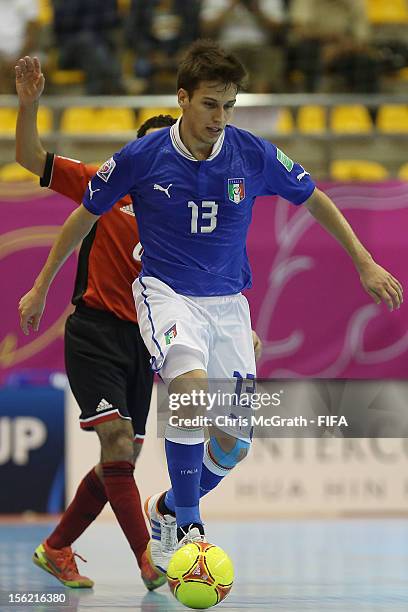Gabriel Lima of Italy makes a break against Egypt during the FIFA Futsal World Cup, Round of 16 match between Italy and Egypt at Korat Chatchai Hall...