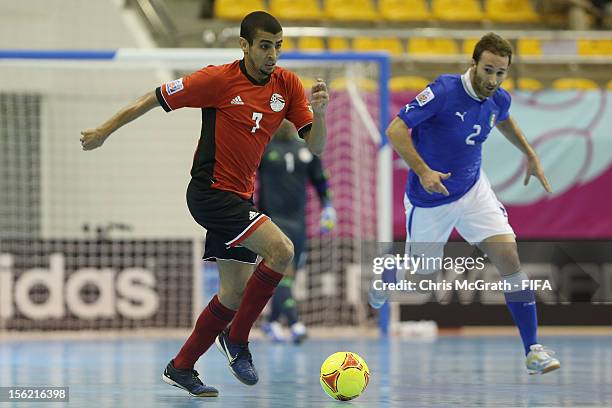 Ahmed Abou Serie of Egypt makes a break against Italy during the FIFA Futsal World Cup, Round of 16 match between Italy and Egypt at Korat Chatchai...