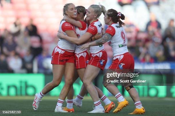 Teagan Berry of the Dragons celebrates a try during the round one NRLW match between Newcastle Knights and St George Illawarra Dragons at McDonald...