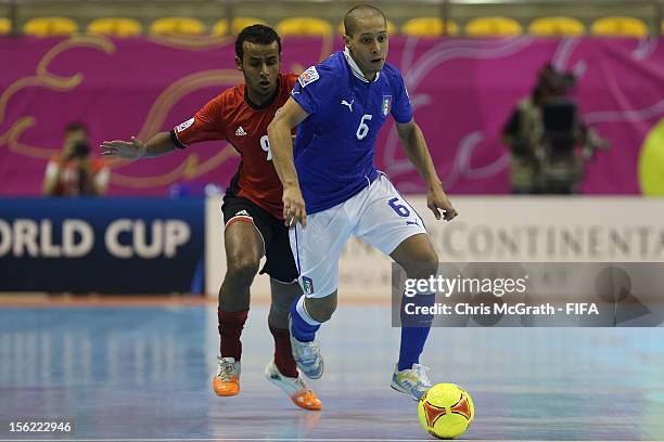 Humberto Honorio of Italy makes a break past Ramadan Samasry of Egypt during the FIFA Futsal World Cup, Round of 16 match between Italy and Egypt at...