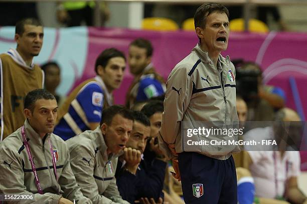 Italy coach Roberto Menichelli yells instructions from the sideline during the FIFA Futsal World Cup, Round of 16 match between Italy and Egypt at...