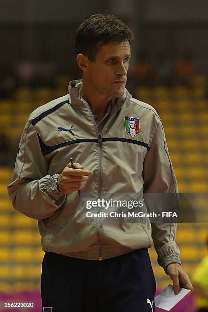Italy coach Roberto Menichelli watches on from the sideline during the FIFA Futsal World Cup, Round of 16 match between Italy and Egypt at Korat...
