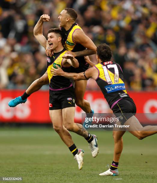 Liam Baker of the Tigers celebrates a goal during the round 19 AFL match between Richmond Tigers and Hawthorn Hawks at Melbourne Cricket Ground, on...