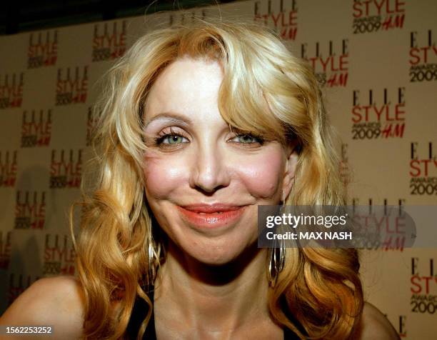 Rock star Courtney Love arrives at the Elle Style Awards in London on February 9, 2009. AFP PHOTO / MAX NASH