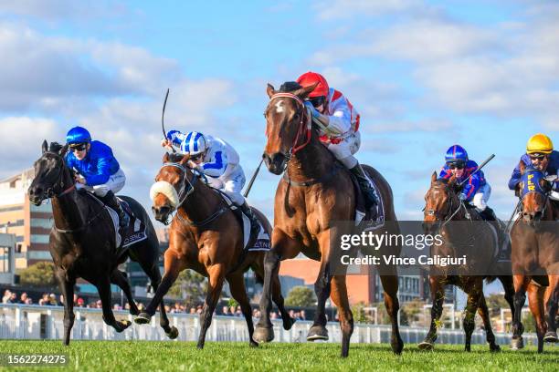 Harry Coffey riding Cute As winning Race 6, the Senet Gambling Law Experts Handicap, during Melbourne Racing at Caulfield Racecourse on July 22, 2023...