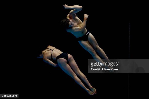Jake Passmore and Clare Cryan of Team Ireland compete in the Synchronized 3m Springboard Mixed Final on day nine of the Fukuoka 2023 World Aquatics...