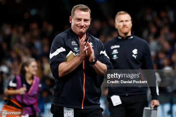 Blues head coach Michael Voss celebrates with fans after winning the round 19 AFL match between Carlton Blues and West Coast Eagles at Marvel...