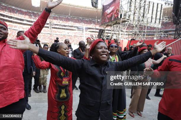 Economic Freedom Fighters leader Julius Malema waves at supporters during the EFF birthday rally, celebrating the 10th anniversary of the party, in...