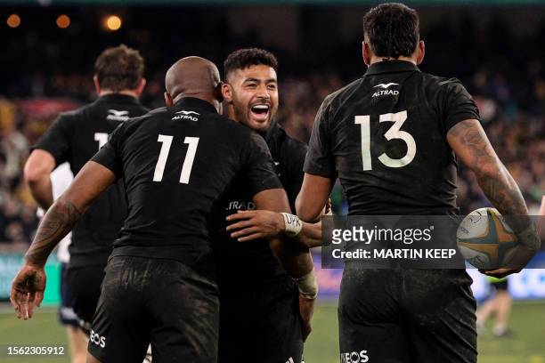 New Zealand's Mark Telea celebrates scoring a try with New Zealand's Richie Mo'unga during the Rugby Championship and 2023 Bledisloe Cup match...