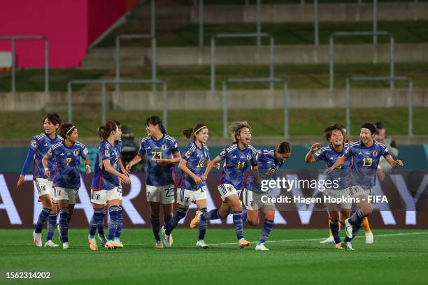 Mina Tanaka of Japan celebrates with teammates after scoring her team's first goal before disallowed due to offside during the FIFA Women's World Cup...