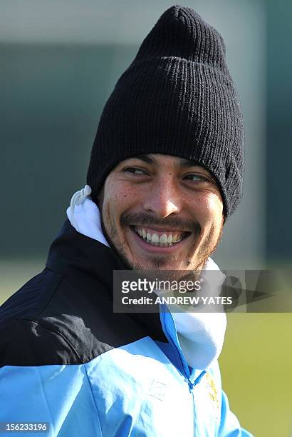 Manchester City's Spanish midfielder David Silva attends a team training session at the club's Carrington training complex, in Manchester, north-west...