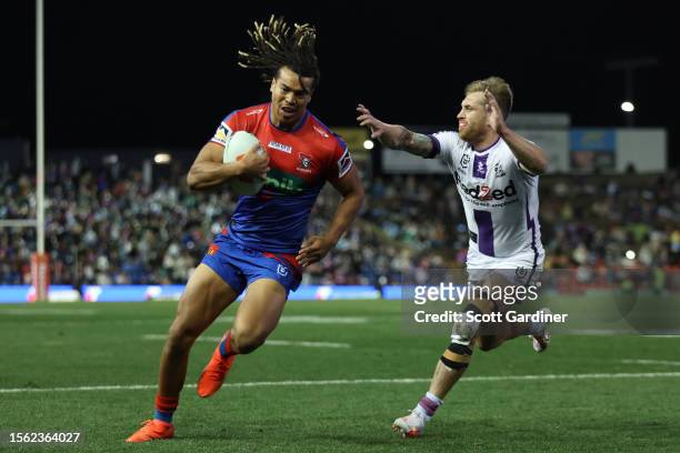 Dominic Young of the Knights scores a tryduring the round 21 NRL match between Newcastle Knights and Melbourne Storm at McDonald Jones Stadium on...