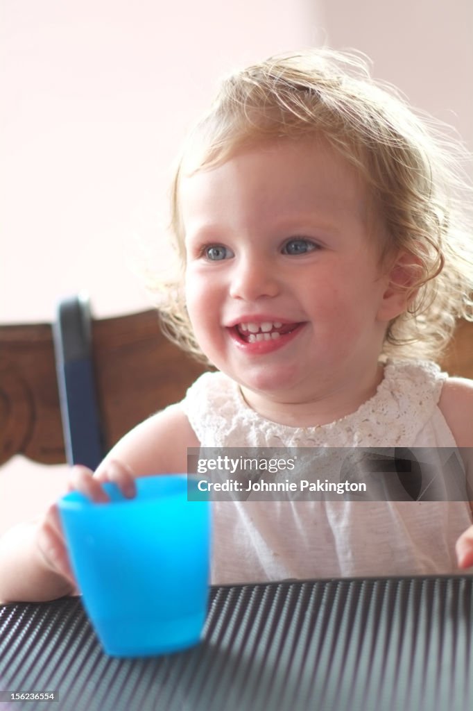 Girl with Blue Water Beaker