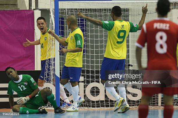 Rodrigo and team mate Je of Brazil celebrate a goal scored by Ari against Panama during the FIFA Futsal World Cup, Round of 16 match between Brazil...
