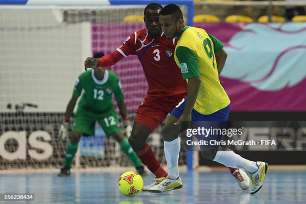Oscar Hinks of Panama contests the ball with Je of Brazil during the FIFA Futsal World Cup, Round of 16 match between Brazil and Panama at Korat...
