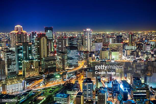 umeda osaka by night, japan - osaka prefecture stock pictures, royalty-free photos & images