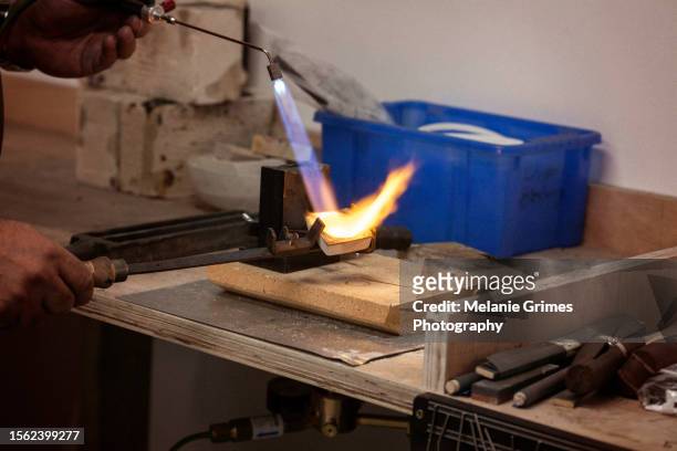 goldsmith's flame - jeweller stock pictures, royalty-free photos & images