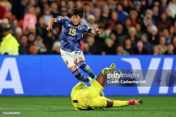 Aoba Fujino of Japan is brought down by Catherine Musonda of Zambia resulting in a penalty to Japan later cancelled due to offside during the FIFA...