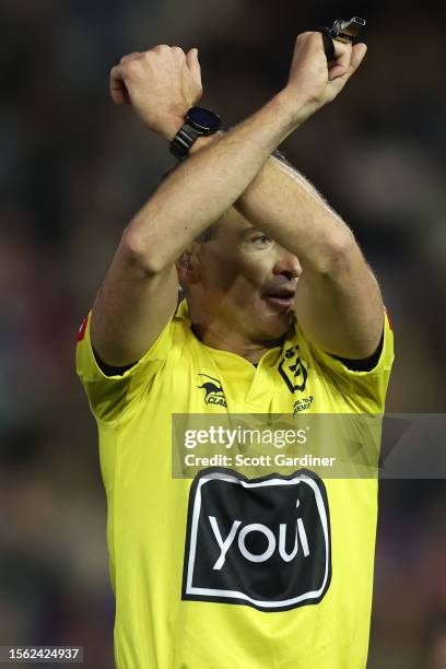 Referee Gerard Sutton place Tariq Sims of the Storm on report during the round 21 NRL match between Newcastle Knights and Melbourne Storm at McDonald...