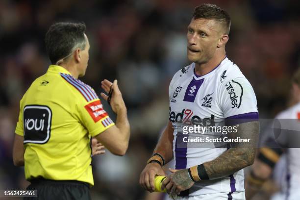 Referee Gerard Sutton sneds Tariq Sims of the Storm to the sin bin during the round 21 NRL match between Newcastle Knights and Melbourne Storm at...