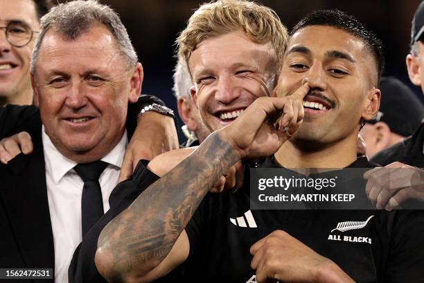 New Zealand's Coach Ian Foster celebrates with Damian McKenzie and Rieko Ioane during the Rugby Championship and 2023 Bledisloe Cup match between...