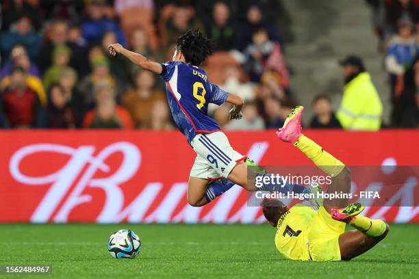 Riko Ueki of Japan is fouled by Catherine Musonda of Zambia resulting in a penalty to Japan and a red card to Musonda during the FIFA Women's World...