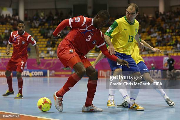 Oscar Hinks of panama contests the ball with Wilde of Brazil during the FIFA Futsal World Cup, Round of 16 match between Brazil and Panama at Korat...