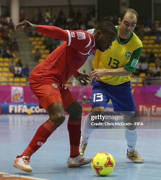 Oscar Hinks of panama contests the ball with Wilde of Brazil during the FIFA Futsal World Cup, Round of 16 match between Brazil and Panama at Korat...