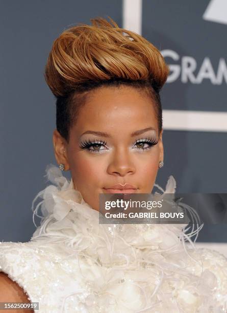 Rihanna arrives on the red carpet at the 52nd Grammy Awards in Los Angeles, California on January 31, 2010. AFP PHOTO/ GABRIEL BOUYS