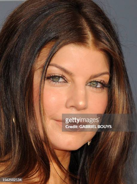 Fergie arrives on the red carpet at the 52nd Grammy Awards in Los Angeles, California on January 31, 2010. AFP PHOTO/ GABRIEL BOUYS