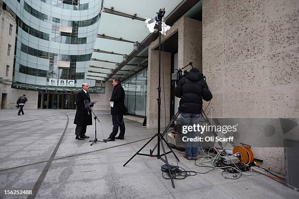 The BBC's media correspondent Torin Douglas is interviewed outside the BBC headquarters at New Broadcasting House on November 12, 2012 in London,...