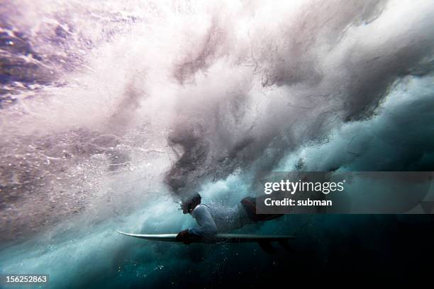 surfer duck diving - duck dive stock pictures, royalty-free photos & images