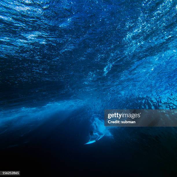 surfer duck diving - duck dive stock pictures, royalty-free photos & images