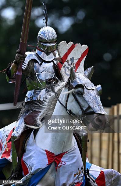 Steve Morris as 'Sir Lancelot' competes during the Legendary Joust jousting event at English Heritage's Kenilworth Castle, near Coventry, central...