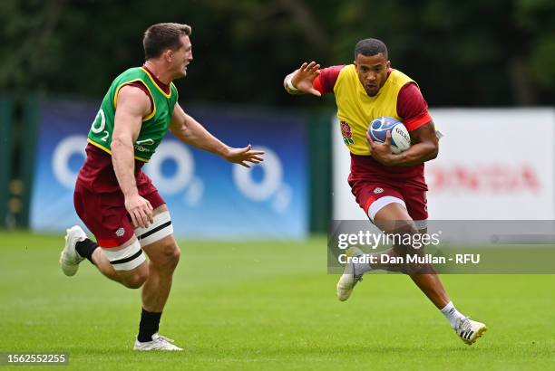 Anthony Watson of England takes on Tom Curry of England during a training session at Pennyhill Park on July 18, 2023 in Bagshot, England.