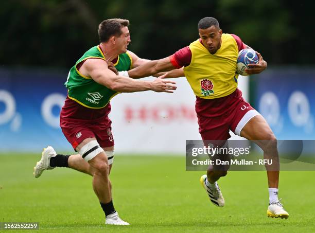 Anthony Watson of England takes on Tom Curry of England during a training session at Pennyhill Park on July 18, 2023 in Bagshot, England.