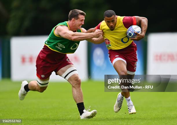 Anthony Watson of England takes on Tom Curry of England during a training session at Pennyhill Park on July 18, 2023 in Bagshot, England.