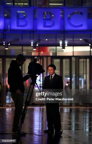 Foreign television crew film outside the BBC headquarters at New Broadcasting House on November 12, 2012 in London, England. Tim Davie has been...