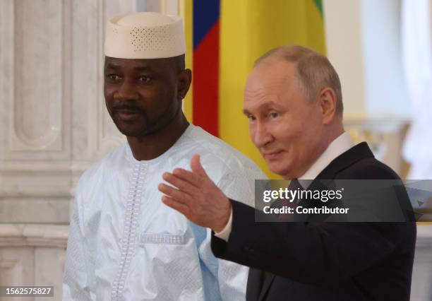 Russian President Vladimir Putin greets President of Mali Assimi Goita during their bilateral meeting, on July 29, 2023 in Saint Petersburg, Russia....