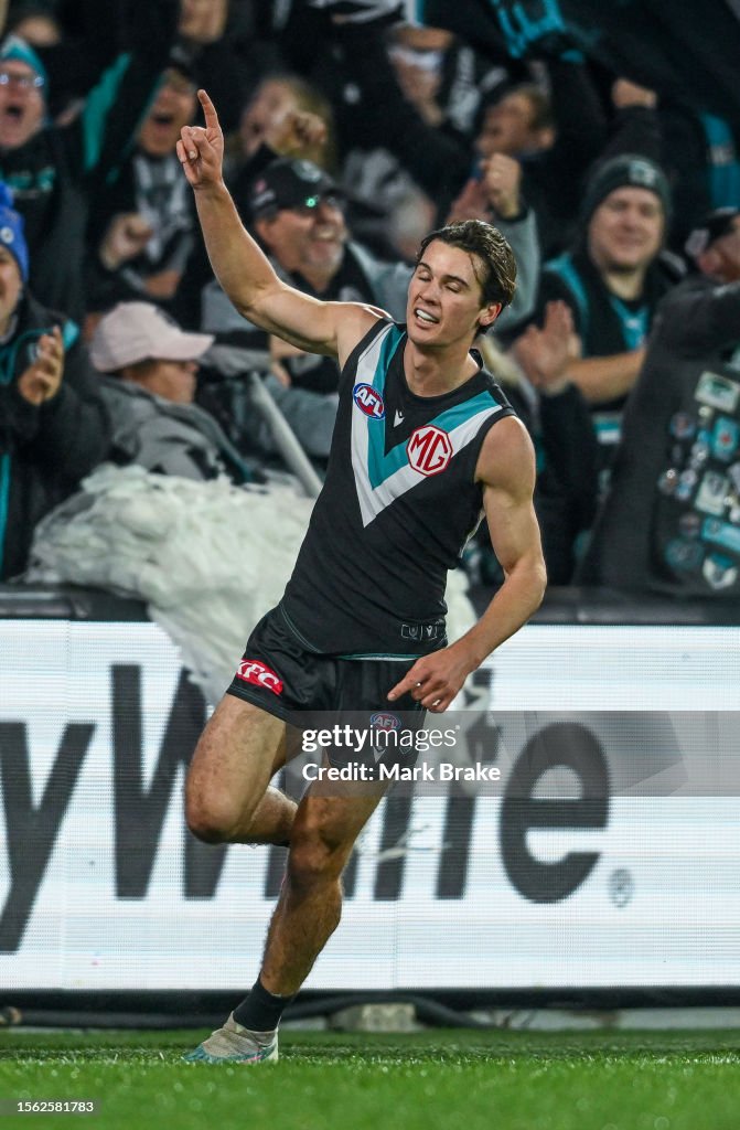 Connor Rozee Signature Connor Rozee of Port Adelaide celebrates a goal during the round 19 ...