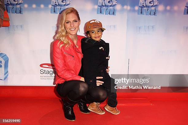 Sandy Moelling with son Jaden attends the Ice Age Live! gala premiere at ISS Dome on November 12, 2012 in Duesseldorf, Germany.