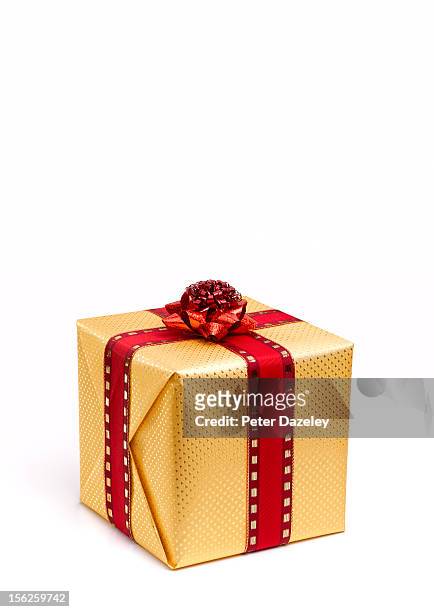 a wrapped christmas present - christmas present stockfoto's en -beelden