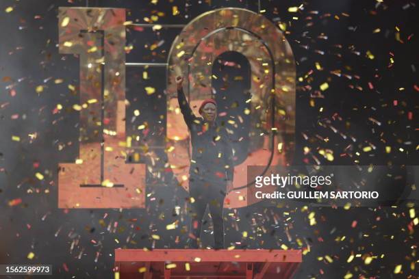 Economic Freedom Fighters leader Julius Malema gestures from the stage as he celebrates the 10th anniversary of the party with his supporters at the...