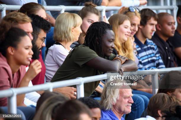 man in stadion audience - crowd anticipation stock pictures, royalty-free photos & images