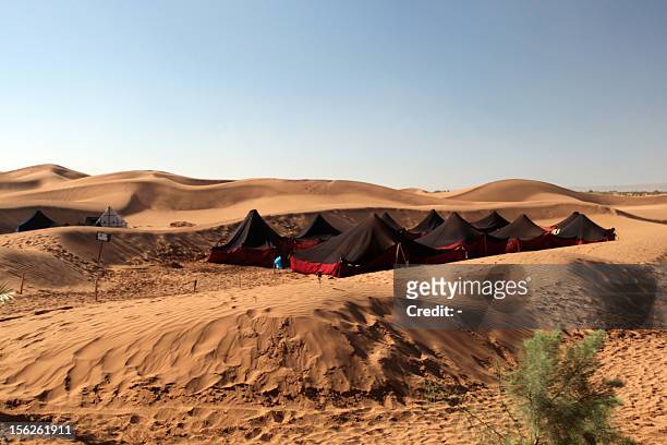 Picture taken on November 10, 2012 shows a nomadic camp in Mhamid El-Ghizlane near the Moroccan city of Zagora. The Taragalte music festival kicked...