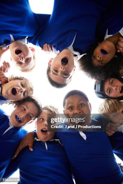 group of boys - rugby scrum stock pictures, royalty-free photos & images