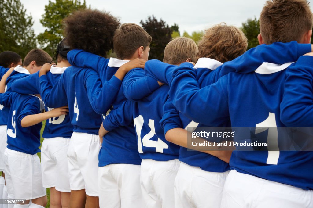 Young rugby players from behind