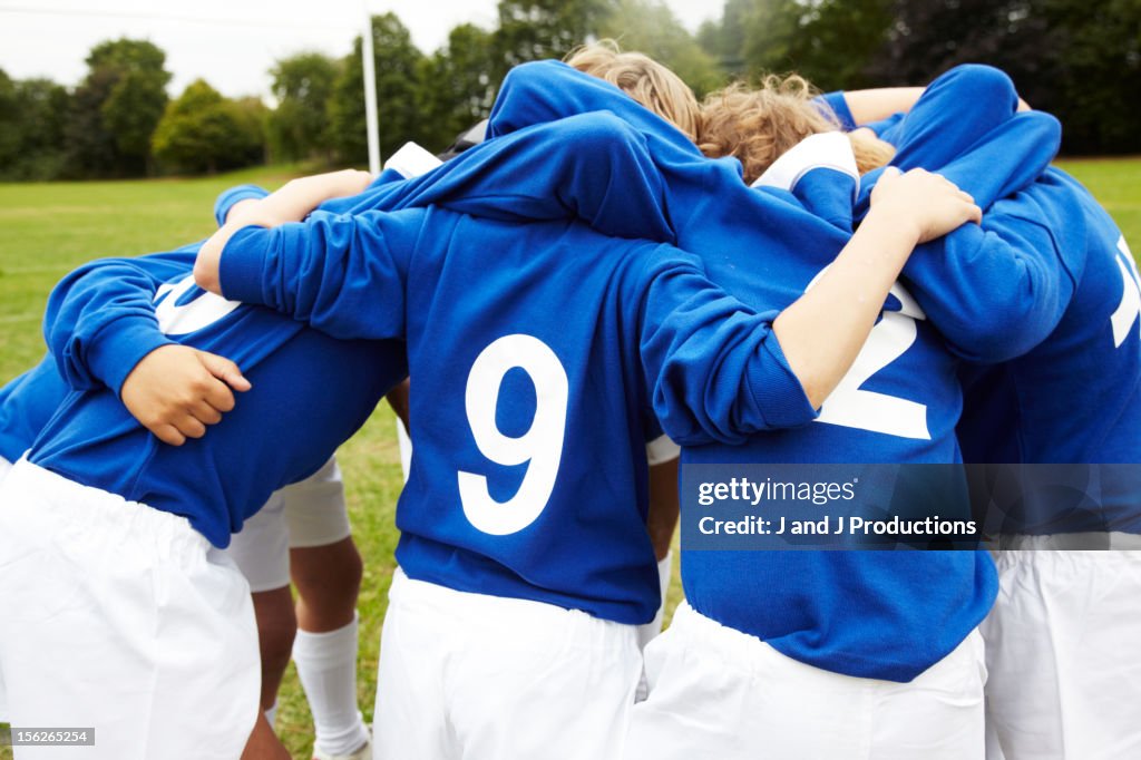 Boys in a rugby scrum